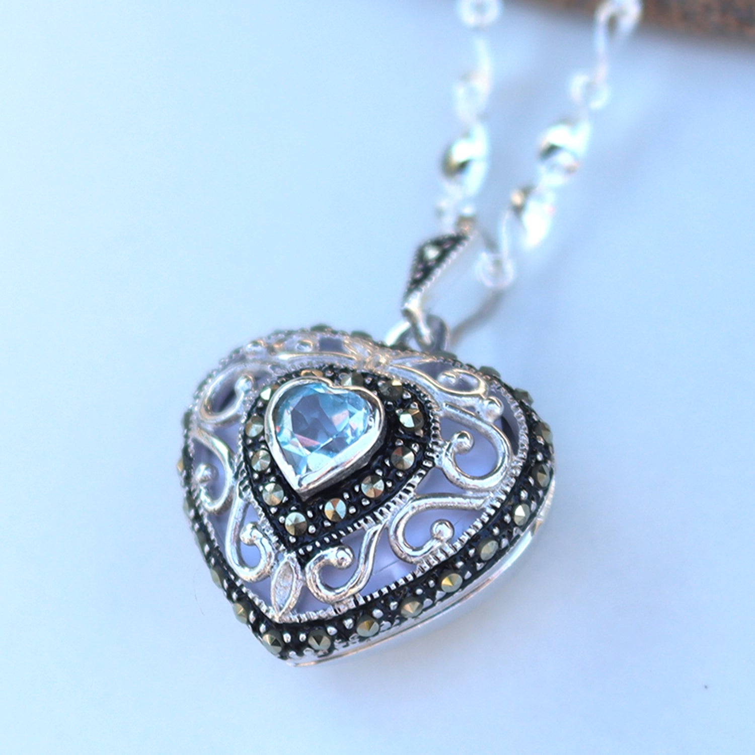 Lily Blanche white gold vintage heart locket with topaz gemstone
