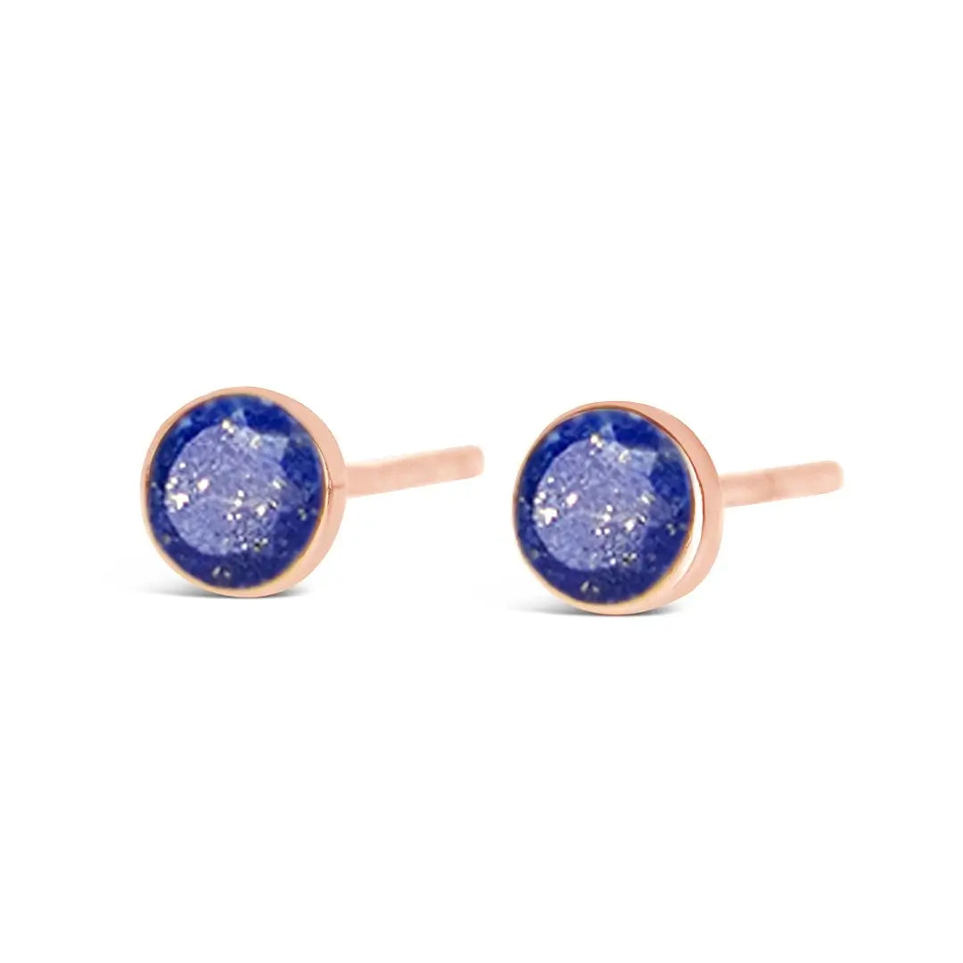 lapis lazuli rose gold stud earrings on white background